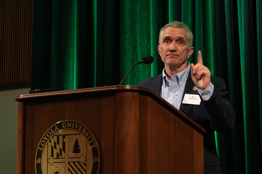 Rob Dickinson '86, SLOB Board Chair, welcoming the room