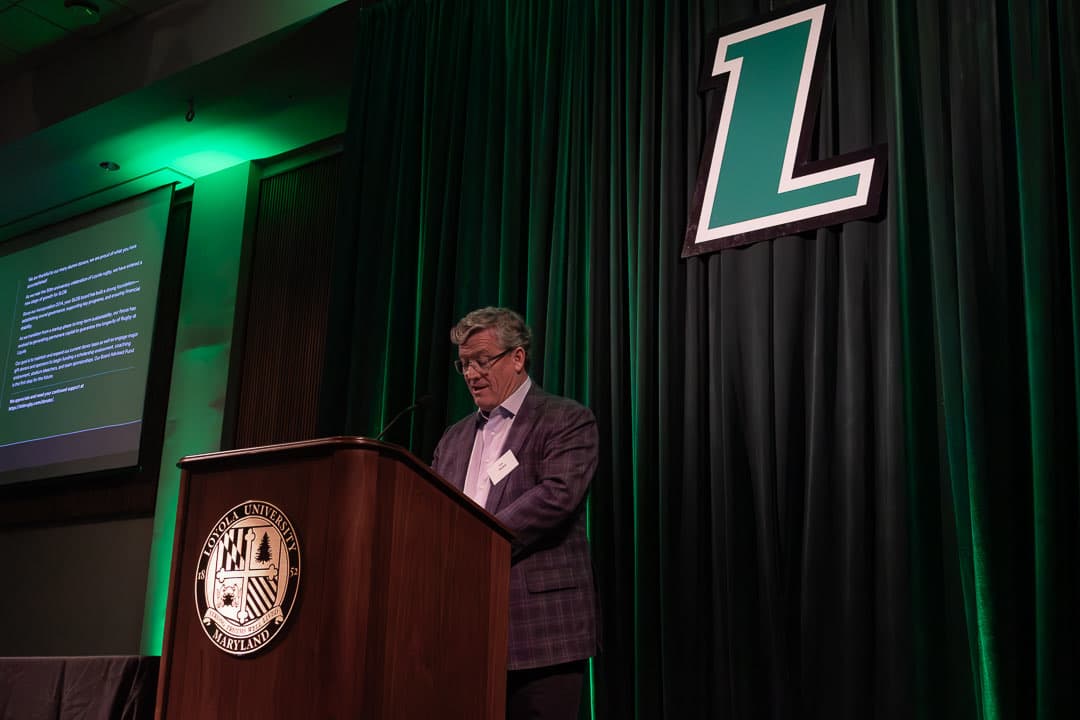 Tim Madey '84 giving the fundraising update