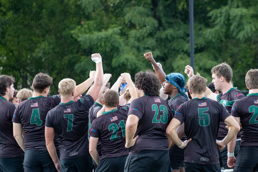 The huddle, fists up, before the restart