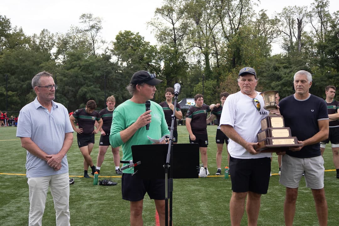Jamie Caulfield, Kenny Ames, John Molli and Victor Norris with the Loc Vetter perpetual trophy
