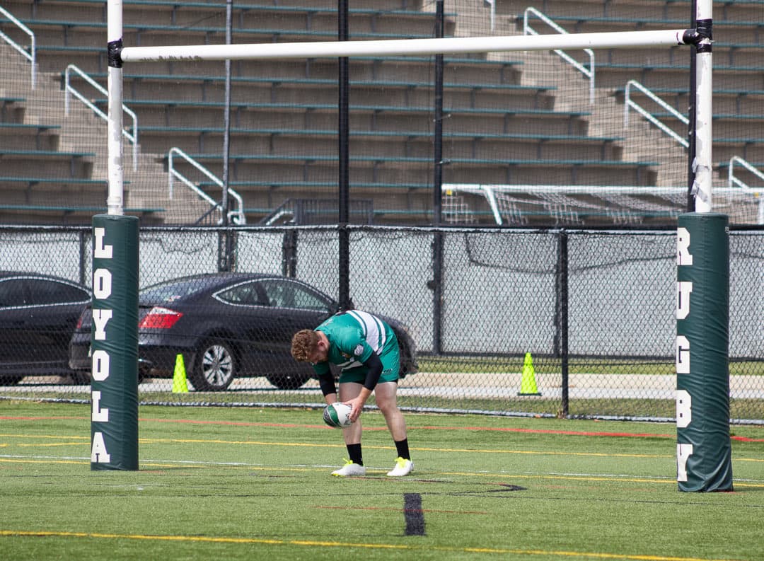 Grounding the ball behind the posts