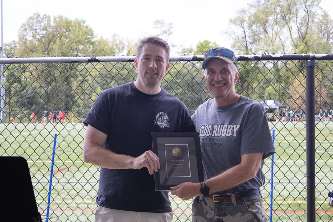 Handing over a plaque